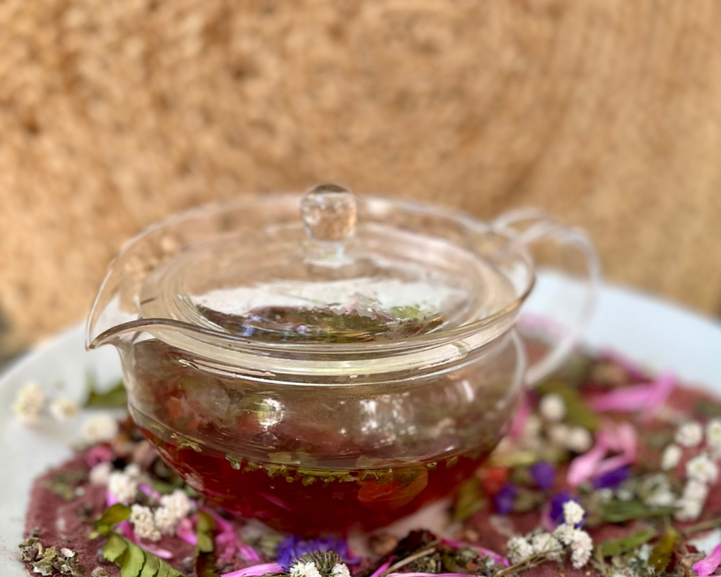 Glass Teapot with woven backdrop